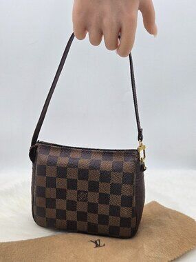 Louis Vuitton Trousse Pochette Handbag
